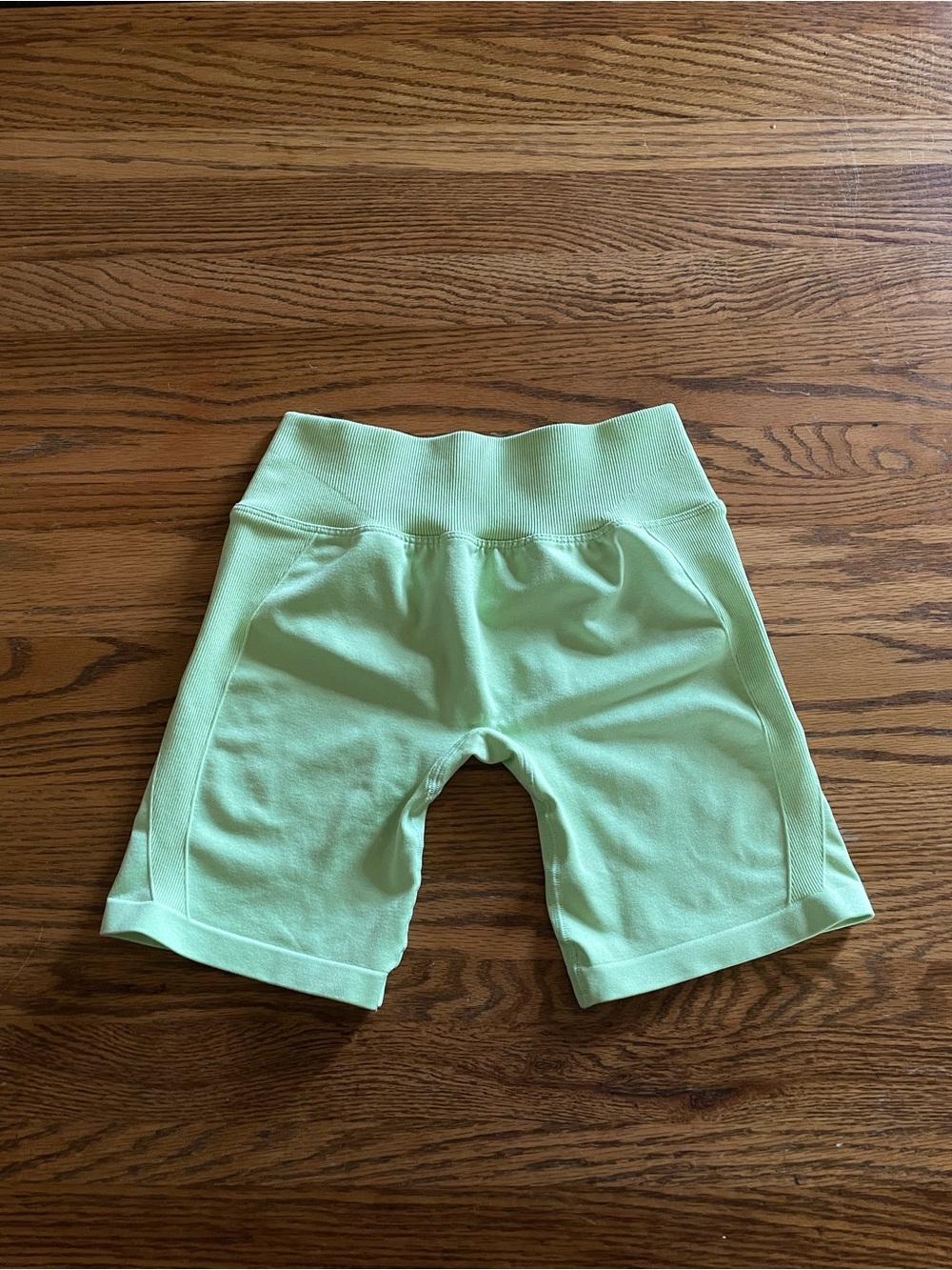 YoungLA for her green hourglass shorts